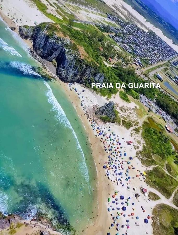 فيلا Casa De 2 Quartos Com 2 Ares-Condicionados Em Torres-Rs - Na Mais Bela Praia Gaucha - Cozinha - Banheiro - Tv Smart 32 E Wi-Fi - Estacionamento - Anfitria Superhost No Bnb المظهر الخارجي الصورة